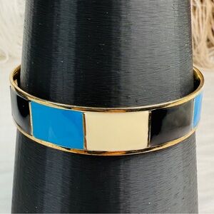 Beautiful, goldtone, black white blue enamel costume bangle bracelet